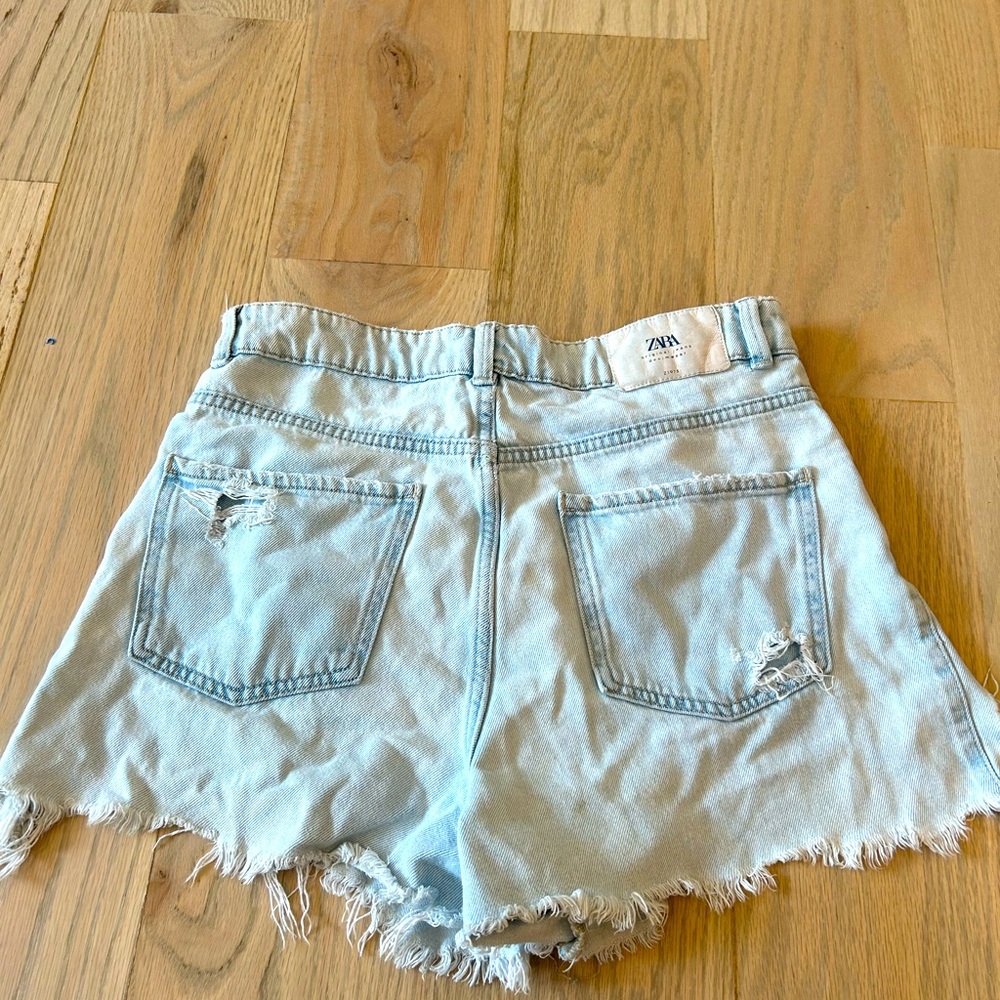 Zara light wash distressed jean shorts